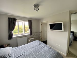 Bedroom One- click for photo gallery